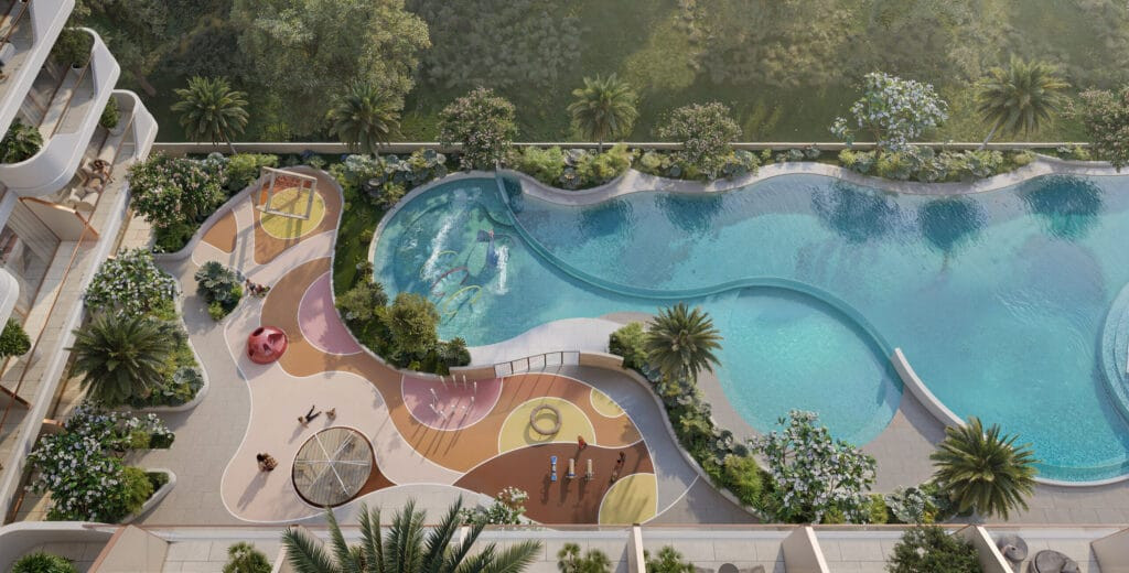 Piscine à débordement et transats d'Oxford Cove by Iman à JVC