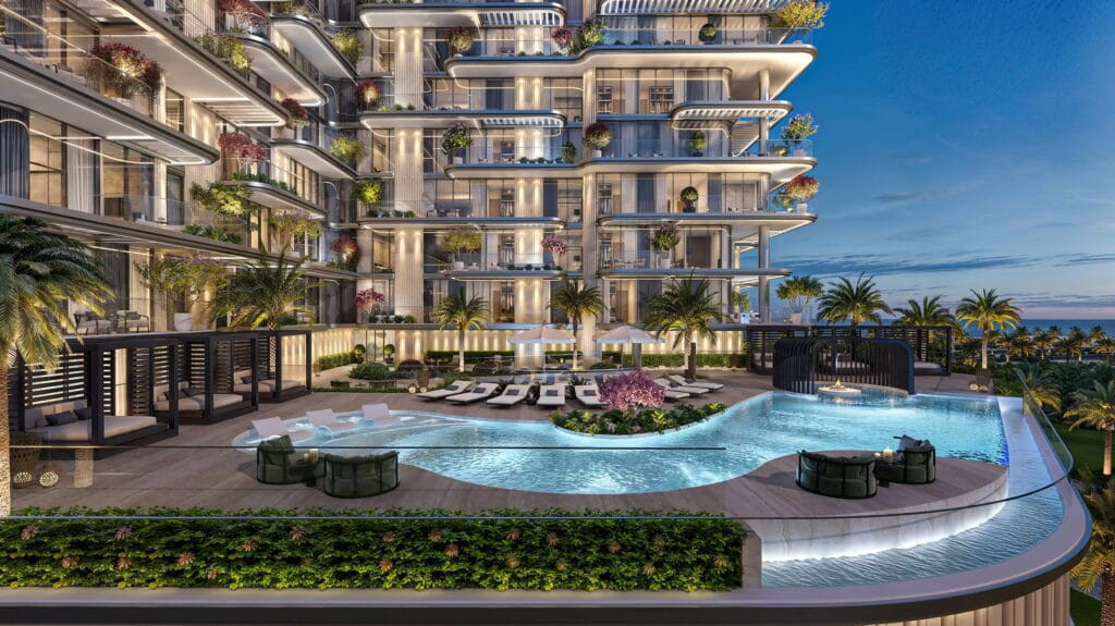 Piscine lagon et jardins paysagers au pied de la façade illuminée de Villa del Divos