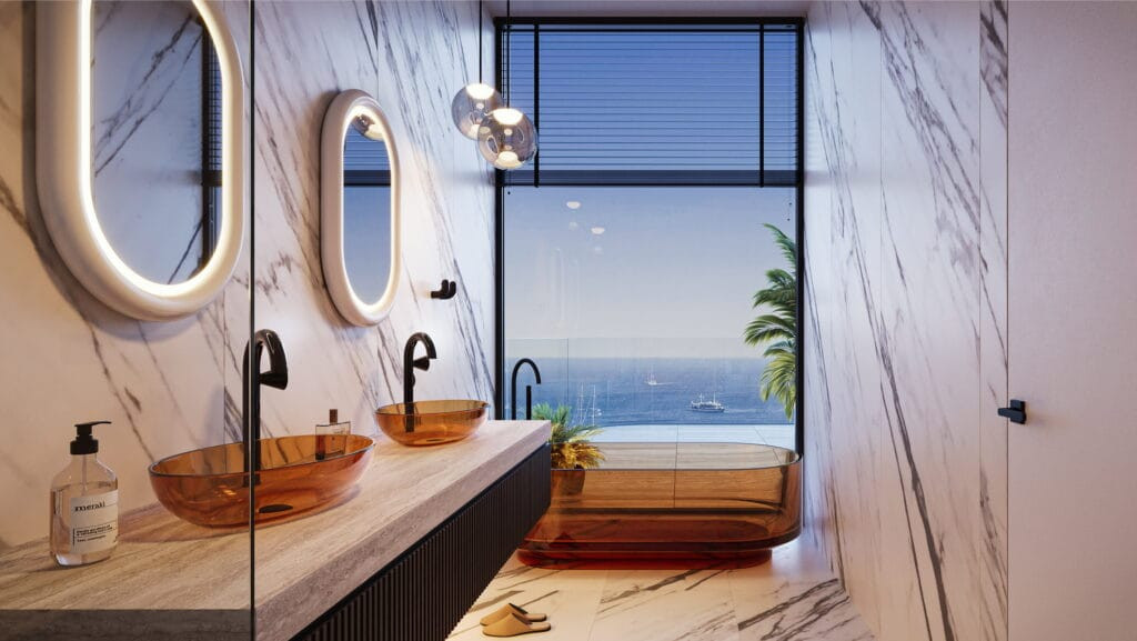 Salle de bain en marbre avec double vasque et vue mer dans une suite Villa del Divos